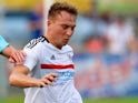Cauley Woodrow in action for Fulham in July 2017