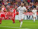 Real Madrid forward Karim Benzema celebrates scoring during his side's La Liga clash with Girona on August 26, 2018