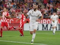 Real Madrid forward Karim Benzema celebrates scoring during his side's La Liga clash with Girona on August 26, 2018