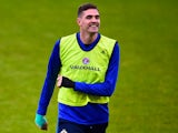 Kyle Lafferty warms up for Northern Ireland on November 7, 2017