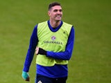 Kyle Lafferty warms up for Northern Ireland on November 7, 2017