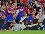 Crystal Palace defender Mamadou Sakho hacks down Mohamed Salah during the Premier League clash against Liverpool on August 20, 2018