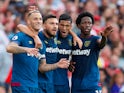 West Ham United striker Marko Arnautovic celebrates with teammates after scoring against Arsenal at the Emirates Stadium on August 25, 2018