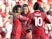 Liverpool striker Mohamed Salah celebrates with Roberto Firmino and Sadio Mane after opening the scoring during his side's Premier League clash with Brighton & Hove Albion on August 25, 2018