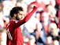 Liverpool striker Mohamed Salah celebrates opening the scoring during his side's Premier League clash with Brighton & Hove Albion on August 25, 2018
