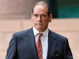 Sir Norman Bettison appears outside court in 2017