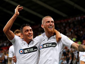 Championship roundup: Swans end 100% Leeds start