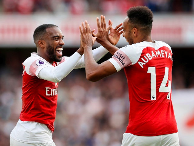 Pierre-Emerick Aubameyang and Alexandre Lacazette celebrate Arsenal's second goal against West Ham United on August 25, 2018