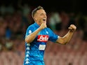 Napoli's Piotr Zielinski celebrates scoring against AC Milan during their Serie A clash on August 25, 2018