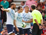 Everton players react after seeing Richarlison sent off during their Premier League clash with Bournemouth on August 25, 2018