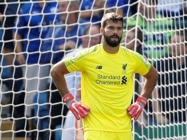 Liverpool goalkeeper Alisson Becker reacts after his mistake during the Premier League clash with Leicester City on September 1, 2018