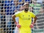 Liverpool goalkeeper Alisson Becker reacts after his mistake during the Premier League clash with Leicester City on September 1, 2018