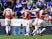 Shkodran Mustafi celebrates with his Arsenal teammates after opening the scoring against Cardiff City on September 2, 2018