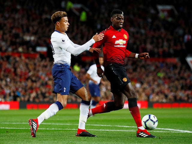 Tottenham Hotspur midfielder Dele Alli chases down Manchester United's Paul Pogba during their Premier League clash on August 27, 2018