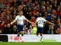 Tottenham Hotspur striker Harry Kane celebrates with Lucas Moura after scoring his side's opening goal during their Premier League clash with Manchester United on August 27, 2018