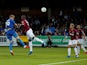 Joe Pigott scores the opener during the EFL Cup second-round game between AFC Wimbledon and West Ham United on August 28, 2018