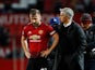 Manchester United manager Jose Mourinho consoles Luke Shaw after his side's defeat to Tottenham Hotspur on August 27, 2018