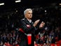 Manchester United manager Jose Mourinho applauds supporters following his side's 3-0 defeat at home to Tottenham Hotspur on August 27, 2018