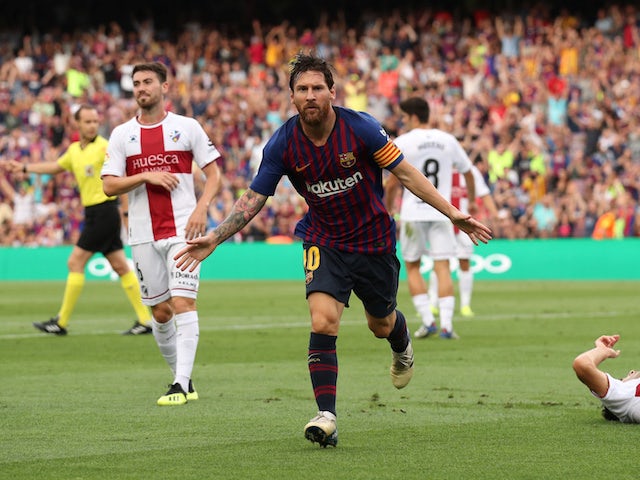 Barcelona forward Lionel Messi celebrates scoring during his side's La Liga clash with Huesca on September 2, 2018