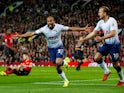 Tottenham Hotspur winger Lucas Moura wheels away in celebration after scoring during his side's Premier League match against Manchester United on August 27, 2018
