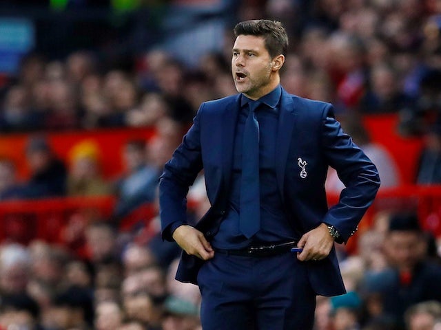 Tottenham Hotspur manager Mauricio Pochettino watches on during his side's Premier League clash with Manchester United on August 27, 2018