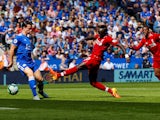 Liverpool striker Sadio Mane scores the opening goal during his side's Premier League clash with Leicester on September 1, 2018