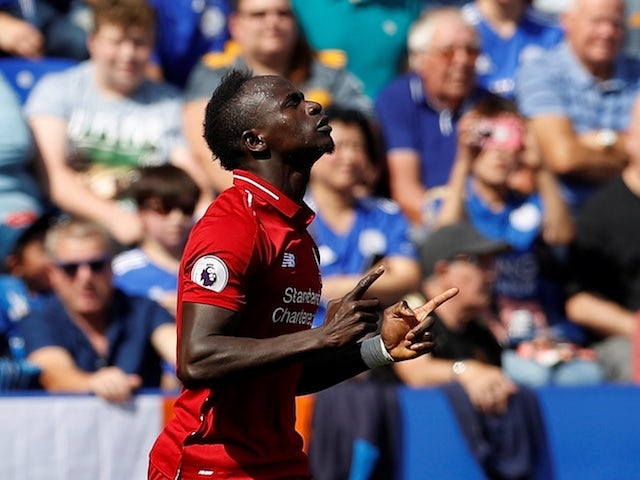 Liverpool striker Sadio Mane celebrates scoring the opening goal during his side's Premier League clash with Leicester on September 1, 2018