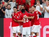 Denmark's Christian Eriksen celebrates with his teammates after scoring his side's opener against Wales on September 9, 2018