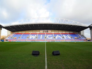 Wigan edge out Millwall in scrappy affair