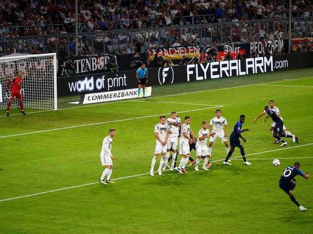 France forward Kylian Mbappe goes for goal with a free kick during his side's UEFA Nations League clash with Germany on September 6, 2018