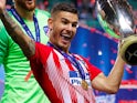 Lucas Hernandez celebrates winning the Supercopa de Espana with Atletico Madrid on August 15, 2018
