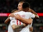 England's Marcus Rashford celebrates with Harry Kane and Kieran Trippier after scoring their first goal in the UEFA Nations League game against Spain on September 8, 2018