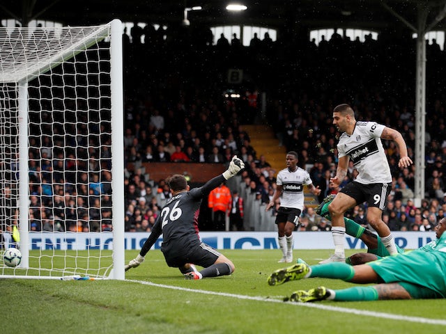 Aleksandar Mitrovic grabs the equaliser during the Premier League game between Fulham and Watford on September 22, 2018