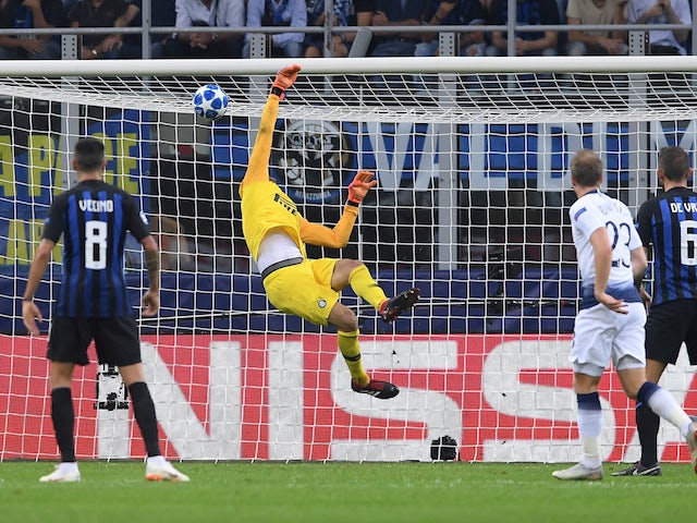 Christian Eriksen scores his side's first during the Champions League group game between Inter Milan and Tottenham Hotspur on September 18, 2018