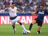 Erik Lamela and Matias Vecino in action during the Champions League group game between Inter Milan and Tottenham Hotspur on September 18, 2018