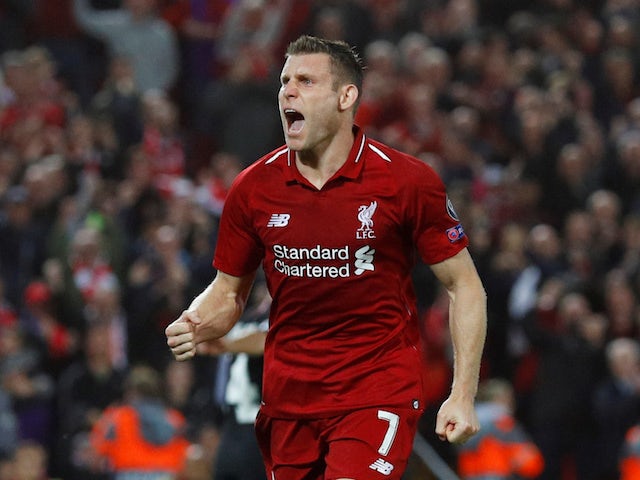 James Milner celebrates scoring the second during the Champions League group game between Liverpool and Paris Saint-Germain on September 18, 2018