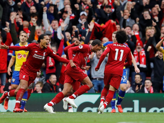 Joel Matip celebrates scoring during the Premier League game between Liverpool and Southampton on September 22, 2018
