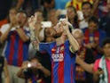 Lionel Messi celebrates scoring a hat-trick against Celtic in September 2016
