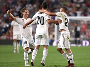 Marco Asensio celebrates after scoring the opening goal for Real Madrid in their La Liga meeting with Espanyol on September 22, 2018
