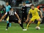 Marcos Alonso and Leo Jaba in action during the Europa League group game between PAOK and Chelsea on September 20, 2018