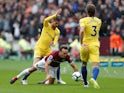 Mark Noble, Jorginho and Marcos Alonso in action during the Premier League game between West Ham United and Chelsea on September 23, 2018