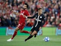 Mohamed Salah and Neymar in action during the Champions League group game between Liverpool and Paris Saint-Germain on September 18, 2018