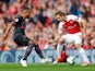 Theo Walcott and Nacho Monreal face off during the Premier League game between Arsenal and Everton on September 23, 2018