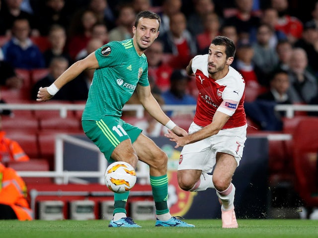Vyacheslav Sharpar and Henrikh Mkhitaryan in action during the Europa League group game between Arsenal and Vorskla Poltava on September 20, 2018
