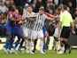 Paul Dummett separates Wilfried Zaha and Kenedy during the Premier League game between Crystal Palace and Newcastle United on September 22, 2018
