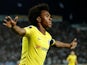 Willian celebrates his opener during the Europa League group game between PAOK and Chelsea on September 20, 2018