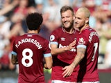 West Ham goalscorers Felipe Anderson, Andriy Yarmolenko and Marko Arnautovic celebrate during their Premier League clash with Manchester United on September 29, 2018
