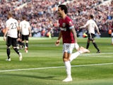 West Ham's Felipe Anderson wheels away in celebration after opening the scoring during his side's Premier League clash with Manchester United on September 29, 2018