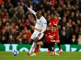 Valencia's Geoffrey Kondogbia in action with Manchester United's Alexis Sanchez on October 2, 2018
