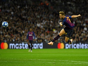Barcelona midfielder Ivan Rakitic scores his side's second goal against Tottenham Hotspur on October 3, 2018
